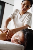 Woman being massaged by masseuse - Alex Microstock02