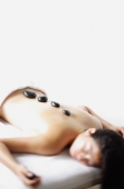 Woman having stone massage - Alex Microstock02