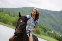 Woman riding horse - Alex Mares-Manton