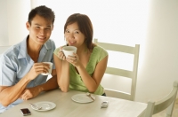 Couple drinking at cafe - Alex Microstock02