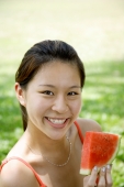 Woman holding slice of watermelon - Alex Microstock02