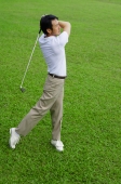 Mature man playing golf - Alex Mares-Manton