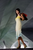 Woman carrying shopping bag - Yukmin