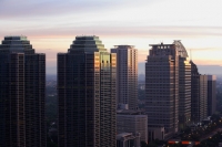 Late afternoon view of office buildings and skyscrapers along Jalan Jend Sudirman, Jakarta - Martin Westlake
