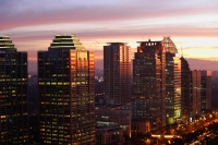 Sunset view of office buildings and skyscrapers along Jalan Jend Sudirman, Senayan, Jakarta - Martin Westlake