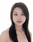 Young woman with long straight hair looking at camera, portrait - blueduck