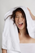 Woman drying her hair with towel - Yukmin