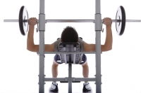 Young man lifting weights - blueduck