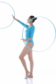 Rhythmic gymnast holding hoop - blueduck