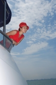 Young woman on yacht, looking at camera - Yukmin