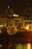 Shipping port at night - Ellery Chua