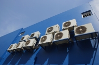 Air conditioning units at building wall - Yukmin