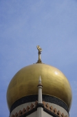 Top of mosque close up shot with skyline background - Nugene Chiang