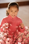 Little girl with cherry blossom branches - Alex Mares-Manton