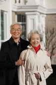 Elderly couple smiling at camera - Alex Mares-Manton