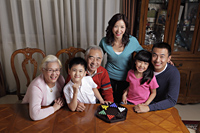 Three generation family playing games together - Alex Mares-Manton