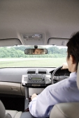 Man driving in car - Asia Images Group