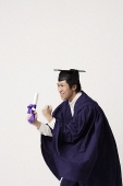 Man with diploma - Asia Images Group