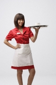 Waitress serving coffee - Asia Images Group