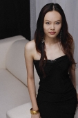 Young woman in black dress - Asia Images Group