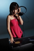 Young woman DJ - Asia Images Group