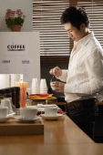 man enjoying coffee break - Asia Images Group