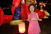 Little girl holding Chinese lantern - Asia Images Group