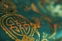 Detail of jade green Chinese silk fabric - Asia Images Group