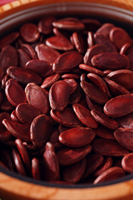 Still life of red melon seeds - Asia Images Group