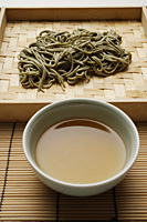 cooked soba noodles with sauce on the side - Asia Images Group