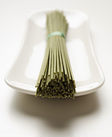 bunch of soba noodles placed on white plate front view - Asia Images Group
