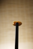 closeup of chopsticks holding a peanut - Asia Images Group