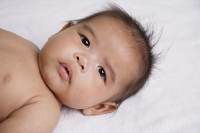 Chinese baby looking at camera - Asia Images Group