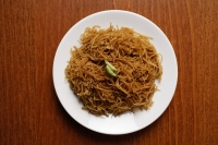 Chinese noodles on plate. - Asia Images Group
