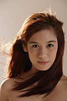 Head shot of Asian girl with long hair - Asia Images Group