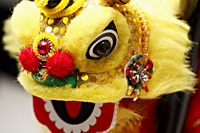 Yellow lion dance toy. Chinese New Year decoration - Asia Images Group