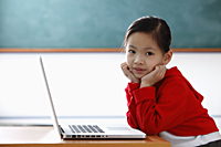 Young Chinese girl with laptop - Asia Images Group