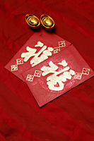 Red envelopes, Hong Bao, and Chinese gold ingots - Asia Images Group