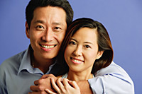Couple looking at camera, portrait - Asia Images Group