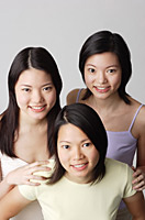 Three young women, portrait - Asia Images Group