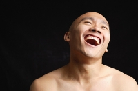 Bald man, laughing, mouth open - Asia Images Group