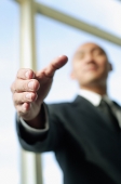 Businessman, hand outstretched, selective focus - Asia Images Group