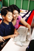 Mother and son using computer - Asia Images Group