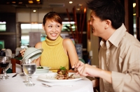Couple in restaurant, dining - Asia Images Group