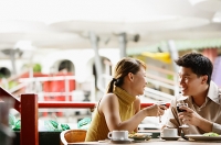 Couple dining in cafe - Asia Images Group