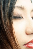 Close up of woman's face - Asia Images Group