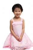 Young girl in pink dress, looking at camera - Asia Images Group