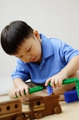 Boy playing with toys - Asia Images Group