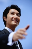 Businessman offering hand for handshake, selective focus - Asia Images Group