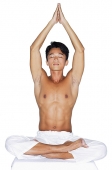 Man practicing yoga - Asia Images Group